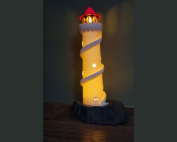 Vuurtoren<br>€29,99 Vuurtoren op rots verlicht met LED, N-Scale (1:160)
